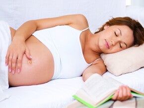 Mulher grávida a dormir Mulher grávida a dormir